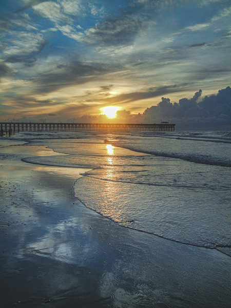 Pier Silhouetted at Sunrise by Richard Mathis