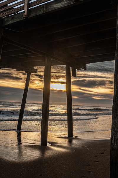 Golden Rays Under the Pier by Richard Mathis